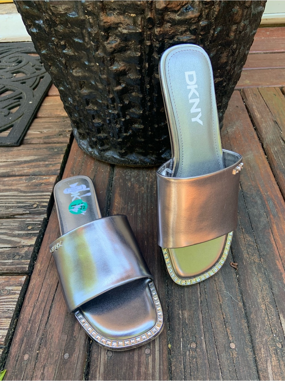 DKNY NWT Metallic Silver Slide Mules with Rhinestone Trim
Size 7.5 - Picture 4 of 7